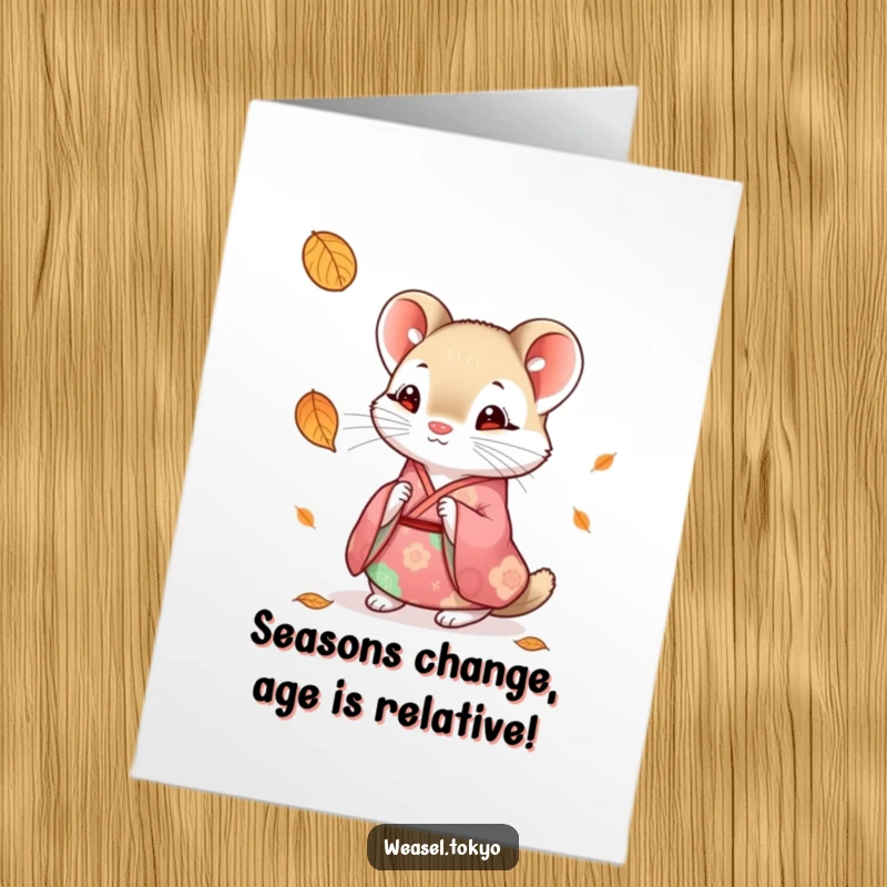 Funny Free Printable Birthday Card: Weasel dressed in a colorful kimono looking curiously at a falling leaf.